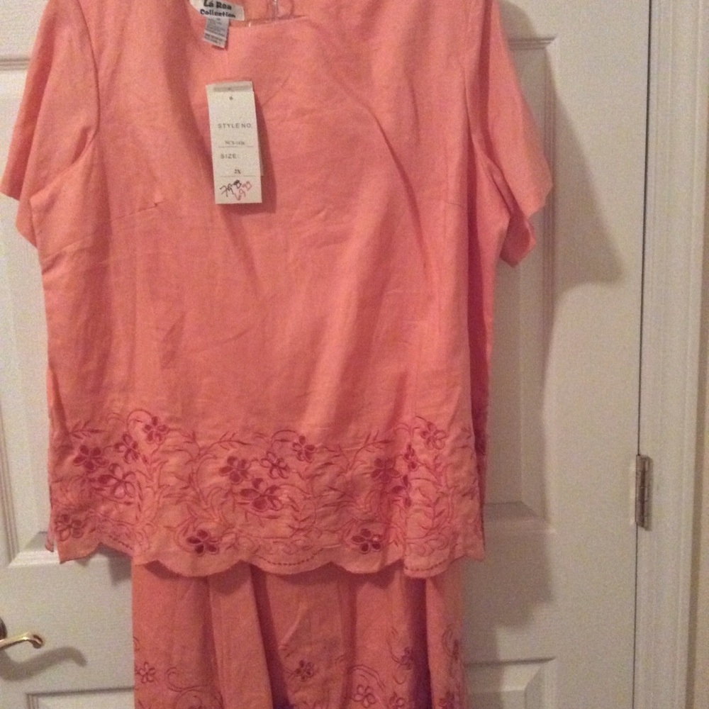 Plus size dress. Color: Coral